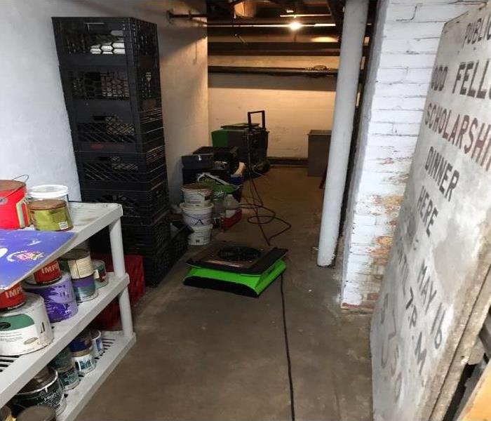 Flooded commercial basement undergoing water mitigation